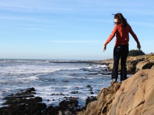 girl-rocks-ocean-coast